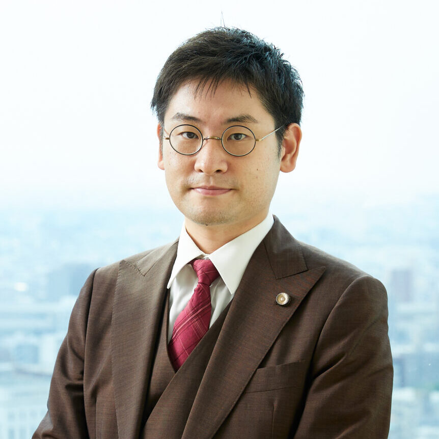 首藤　哲伺 氏